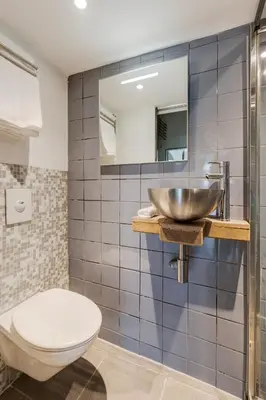 a bathroom with a sink and a toilet at Beautiful 'tiny-house' in Utrecht City Center in Utrecht