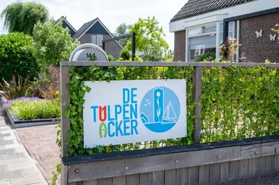 a sign that reads be to prom a clipper on a fence at 10 persons Tulpenacker Comfort in Roelofarendsveen