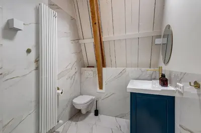 a bathroom with a toilet and a sink at Luxury Studio in Utrecht Center - view on canal in Utrecht