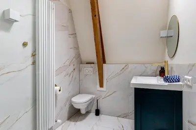 a bathroom with a toilet and a sink at 2 Luxurious Studios in Utrecht City Center in Utrecht