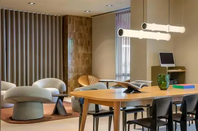 a meeting room with a table and chairs at Amsterdam Marriott Hotel in Amsterdam