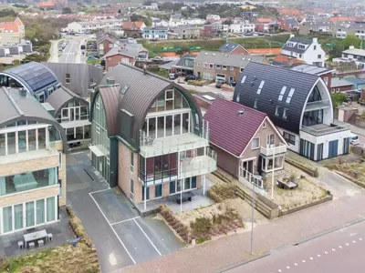 an aerial view of a city with houses at Holiday Home De Zeeparel by Interhome in Egmond aan Zee
