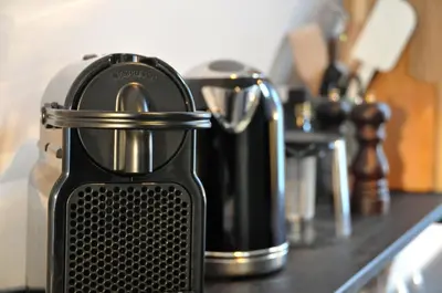 a black and silver appliance sitting on top of a counter at Betty Blue Bed & Breakfast in Gouda