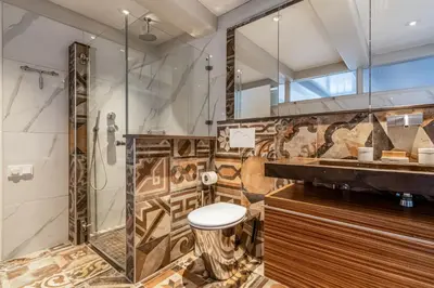 a bathroom with a shower and a toilet at The Dutch Buoy in Monnickendam