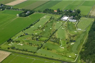 an aerial view of a golf course at Hotel Beemster in Middenbeemster