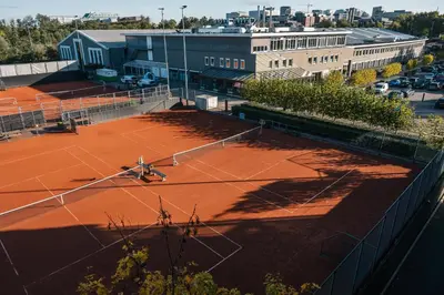 an overhead view of a tennis court with a person on it at Hotel & Wellness Zuiver in Amsterdam