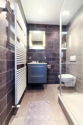 a bathroom with a sink and a toilet and a tub at B&B La Festa in Amsterdam