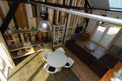 an overhead view of a living room with a table and a couch at Paardenstal, Private House with wifi and free parking for 1 car in Weesp