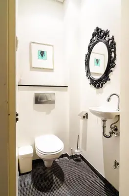 a bathroom with a toilet and a sink at Marnix360apartments Modern in Amsterdam