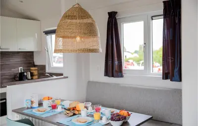 a table with food on it in a kitchen at Cozy Home In Breukelen With Wifi in Breukelen