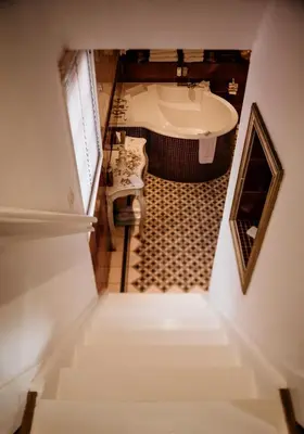 an overhead view of a bathroom with a bath tub at Villa Beukenhof in Oegstgeest
