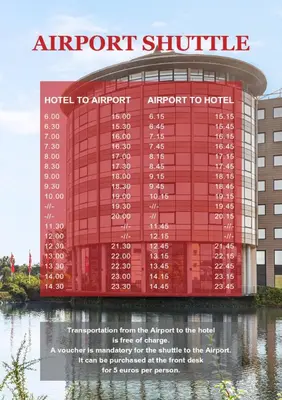 an airport shuttle sign in front of a building at Amedia Amsterdam Airport Schiphol, Trademark Collection by Wyndham in Schiphol