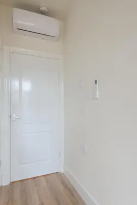a room with white walls and a door at Happy Day´s in Amsterdam