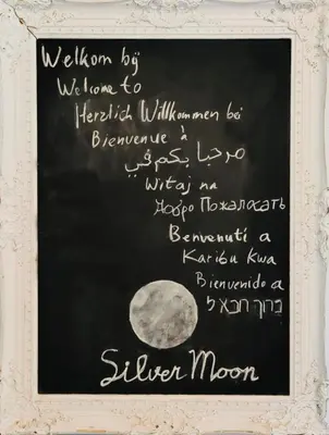 a chalkboard with the words wisdom by the moon at Silver Moon Bed & Breakfast in Voorschoten
