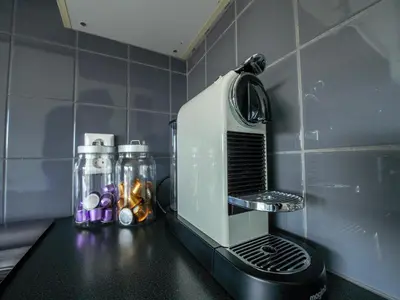 a toaster sitting on top of a kitchen counter at Apartment in Katwijk near the Beach in Katwijk