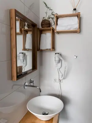 a bathroom with a toilet and a sink at Wolf Hotel Kitchen & Bar in Alkmaar