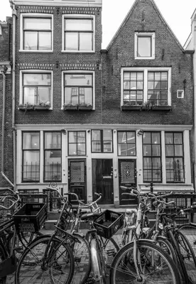 a group of bikes parked in front of a building at Luxury Flower Market Apartment in Amsterdam
