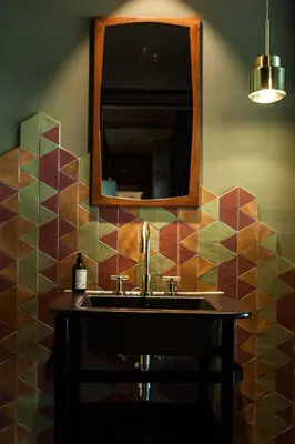 a bathroom with a sink and a mirror at Hotel V Fizeaustraat in Amsterdam
