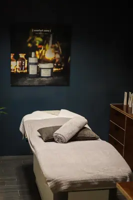 a bed with two pillows on it in a room at WestCord Fashion Hotel Amsterdam in Amsterdam