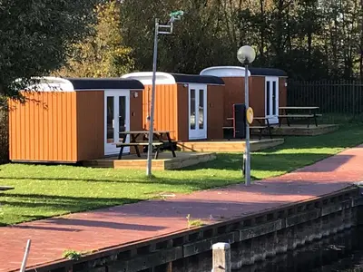 a row of mobile homes in a park at Marinaparcs Naarden in Naarden