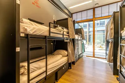 a dorm room with bunk beds in it at Hostelle - women only hostel Amsterdam in Amsterdam