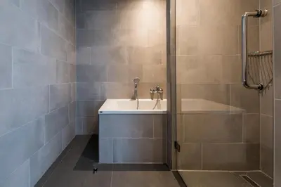 a bathroom with a sink and a shower at YAYS Amsterdam North by Numa in Amsterdam