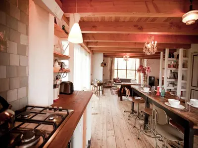 a kitchen with a stove and a counter top at Holiday Home in Bergen near Forests in Bergen