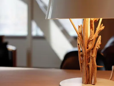 a table with a lamp on top of a table at Apartment in Heiloo near North Sea Beach in Heiloo