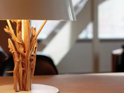 a table with a lamp on top of a table at Apartment in Heiloo near North Sea Beach in Heiloo