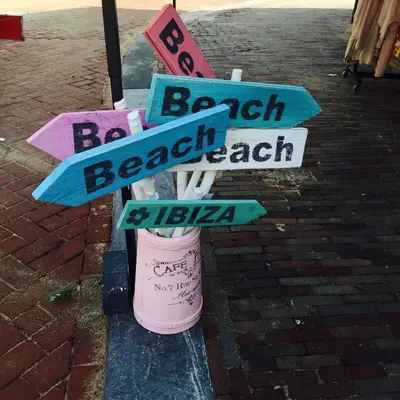 a bunch of street signs on a pole at Reumann Holiday Apartments De Schelp 47 in Zandvoort
