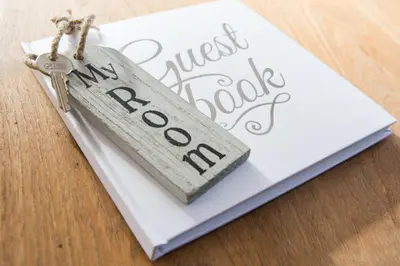 a book with a tag that reads the most precious book at B&B Slapen bij de burgemeester in Sint Pancras