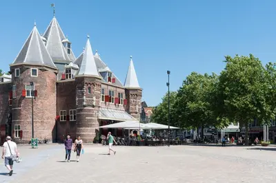 a group of people walking in front of a castle at Saint Claire Studio in Amsterdam