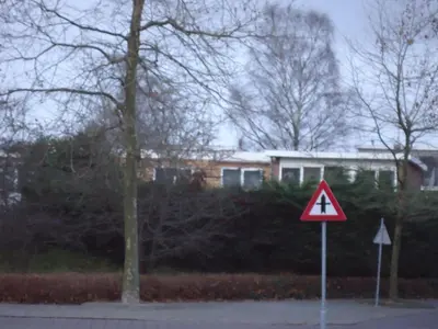 a street sign in front of a house at B&B Sloterpark in Amsterdam