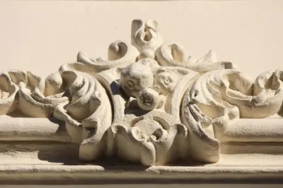 a white carving of a statue of a person at De Verrassing in Utrecht