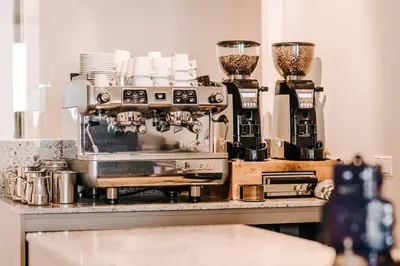 a kitchen counter with a coffee machine on it at Boulevard 5 in Zandvoort