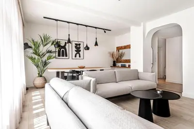 a living room with a couch and a table at Sack-Time fashion boutique hotel 1 & 2 in Zandvoort
