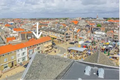 an aerial view of a city with buildings and people at Vakantiehuis Katwijk Andreasplein in Katwijk
