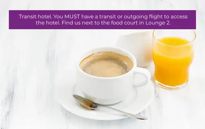 a cup of coffee and a glass of orange juice at YOTELAIR Amsterdam Schiphol Transit Hotel in Schiphol