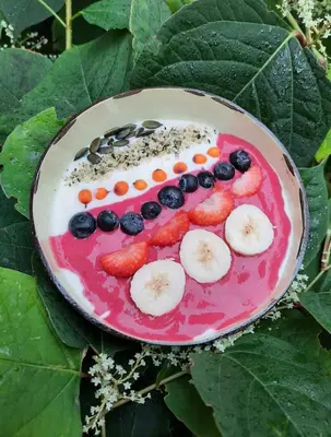 a cake with fruit in the shape of a face at Villa La Vida in Egmond aan Zee