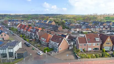 an aerial view of a town with houses at Wijkiki Surf House in Wijk aan Zee