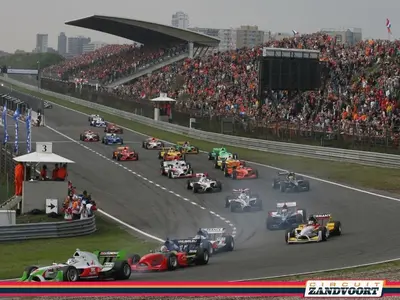 a group of racing cars on a race track at Appartement Lefferts in Zandvoort