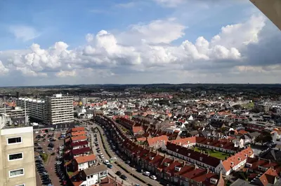 an aerial view of a city with buildings and cars at Appartement Lefferts in Zandvoort