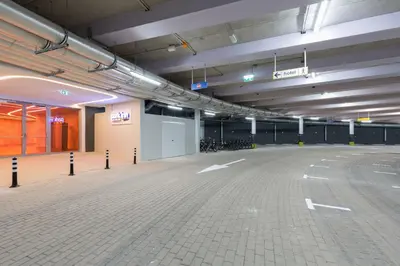 an empty parking lot in a parking garage at Park Inn by Radisson Amsterdam City West in Amsterdam