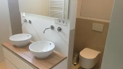 a bathroom with a sink and a toilet at Terrace Apartment Cyclades Free Parking in Amsterdam