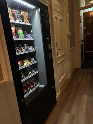 a refrigerator filled with lots of food and drinks at Hotel Hortus in Amsterdam