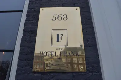 a hotel sign on the side of a building at Hotel Frank since 1666 in Amsterdam