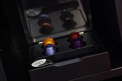 a toy stove with different colored knobs on it at The Muse Amsterdam - Boutique Hotel in Amsterdam