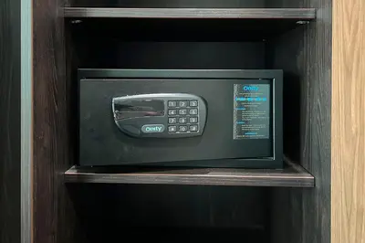 a microwave oven sitting on a shelf in a cabinet at Hotel Levell in Amsterdam