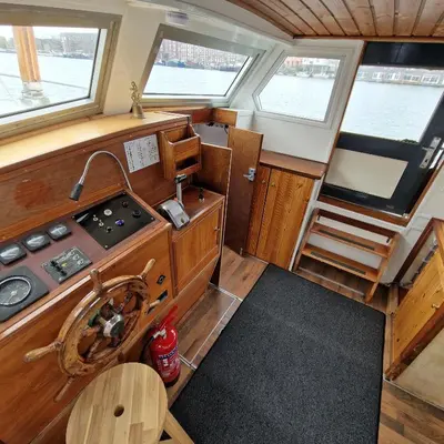 an upper view of a kitchen in a boat at City Sailing in Amsterdam