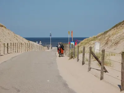 a group of people riding horses on the beach at Modern Apartment in Noordwijk near the Sea in Noordwijk